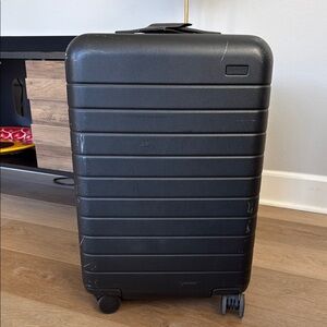 Away Black Rolling Suitcase